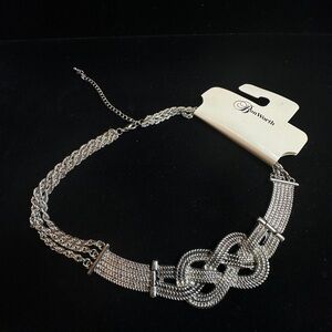 Elegant Silver Toned Chain Necklace with lLovers Knott Design